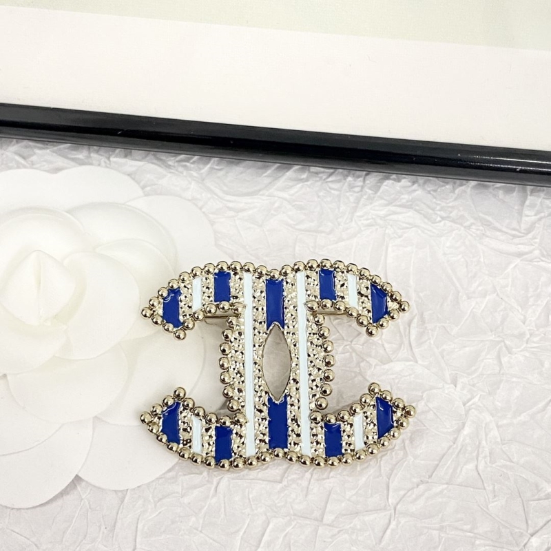 Ch*el brooches